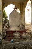 Bai Sema (Thai: ใบเสมา) are the boundary stones which designate the sacred area for a phra ubosot (ordination hall) within a Thai Buddhist temple.<br/><br/>

Wat Sao Thong Tong (Golden Pillar Temple), also known as Wat Wang Tawan Tok, was built between 1888 and 1901. The temple grounds contain three old connected houses, fine examples of traditional Southern Thai-style architecture.